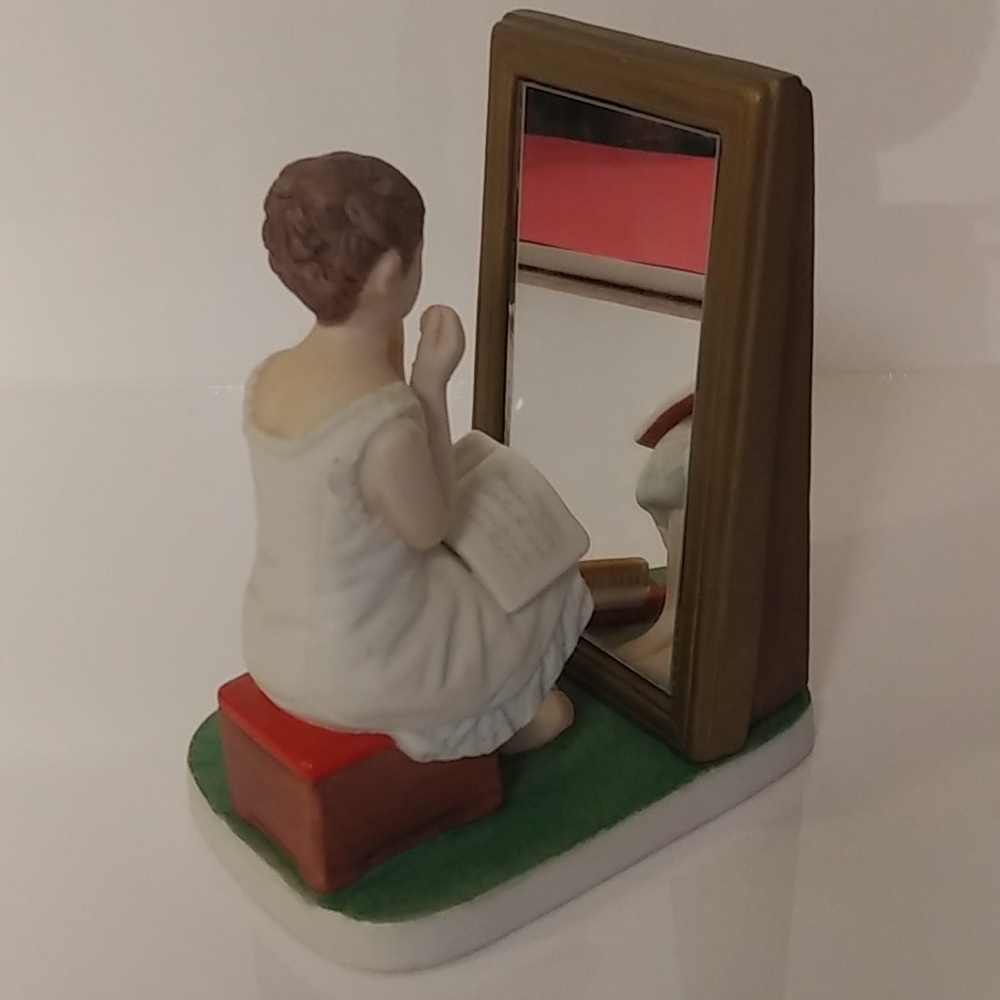 Norman Rockwell The Girl looking in the mirror